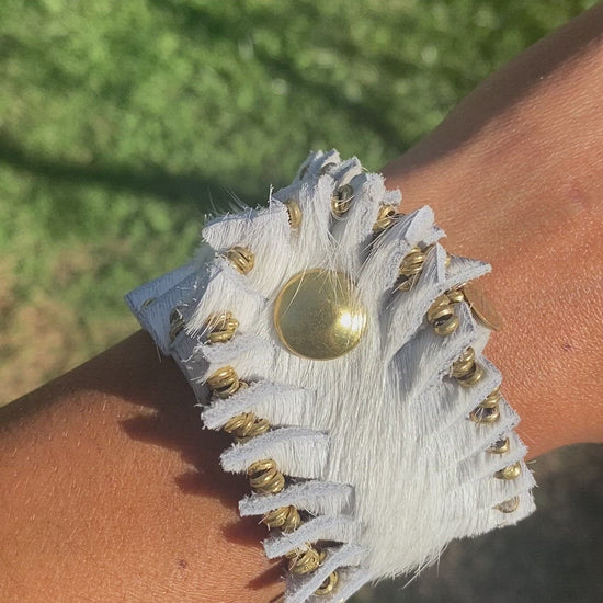 Repurposed off-white hair-on cowhide leather wrap beaded bracelet with solid brass beads and brass snaps.. Unisex jewelry.