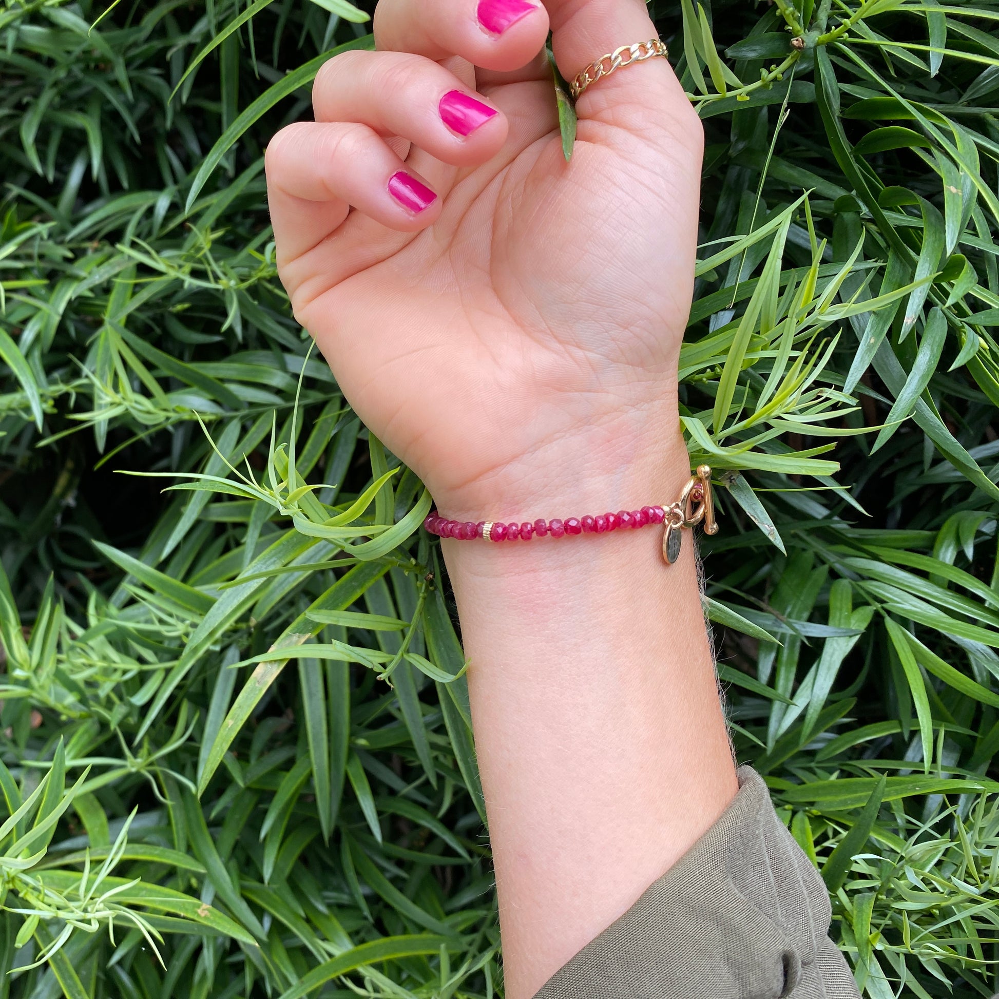 Natural Ruby gemstone bracelet with 14K gold filled toggle closure.